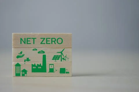 Wooden cube block Net zero Carbon neutral concept. green icon on background. Stock Photos