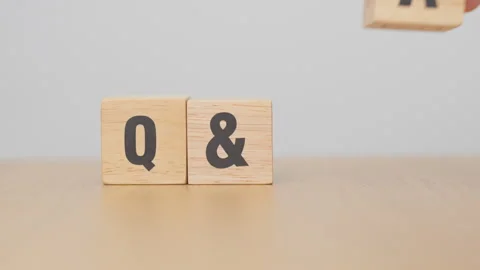 Wooden cube block of Q and A with Question mark icon. FAQ, frequency asked .. Stock Footage 328071251