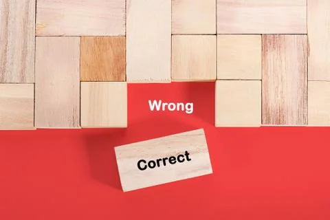 Wooden cube with a word wrong correct Stock Photos