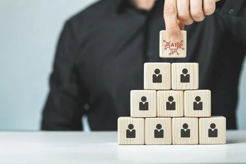 Wooden cubes of the application of artificial intelligence in business Stock Photos
