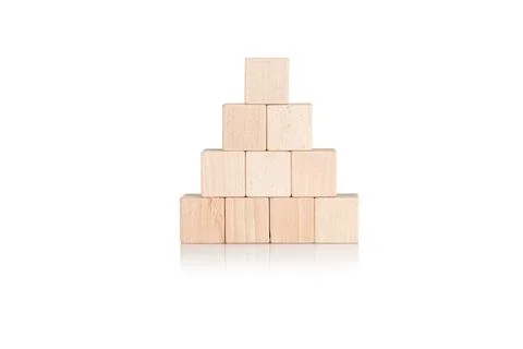 Wooden cubes in the form of a pyramid on an isolate white background Stock Photos