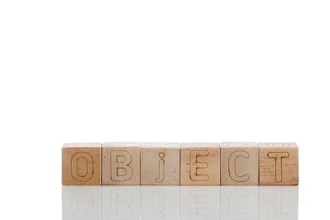 Wooden cubes with letters object on a white background Stock Photos