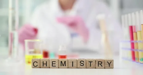 Wooden cubes meticulously positioned to form word SCIENCE Stock Footage 283762529