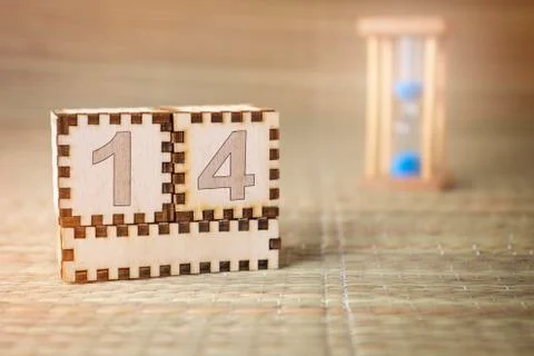 Wooden cubes with the number 14 Stock Photos