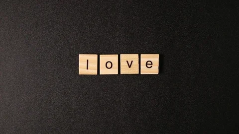 Wooden cubes open and sets up a word "Love" Stock Footage 88264197