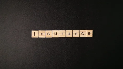 Wooden cubes open and sets up a word "Insurance" Stock Footage 88264198