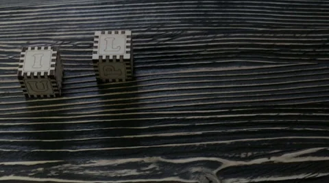 Wooden cubes on the table, fish Stock Footage 63173358