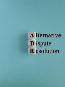 Wooden cubes with word ADM Alternative Dispute Resolution 스톡 사진