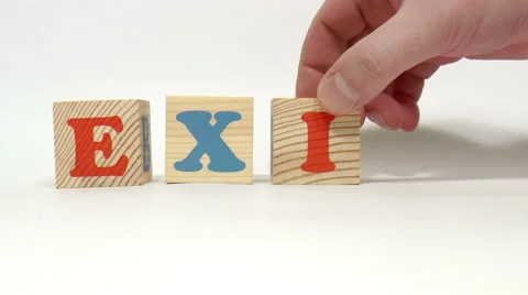 Wooden cubes. Word exit Stock Footage 47846233