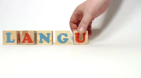 Wooden cubes. Word language Stock Footage 47848855