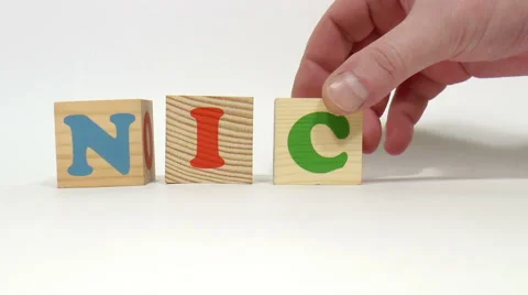 Wooden cubes. Word nice Stock Footage 48028031