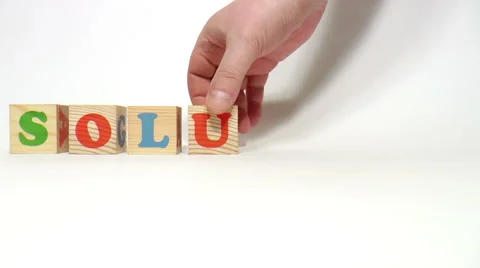 Wooden cubes. Word solution Stock Footage 48032104