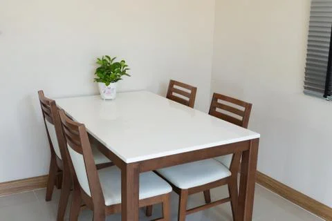 Wooden dining table for 4 people Stock Photos