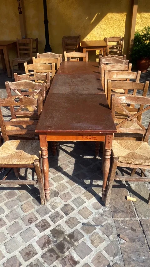 Wooden dining table. Chairs. Vertical video Stock Footage 286346066