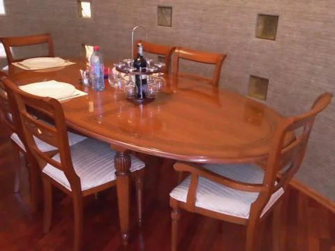 Wooden dining table with Seating for VIPs and guests Stock Photos