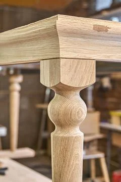 Wooden dining table of solid oak build process in workshop Stock Photos