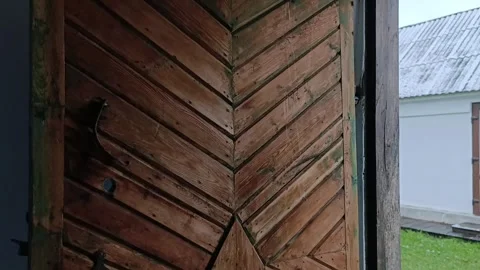 A wooden door with a chevron pattern on it Stock Footage 293510291
