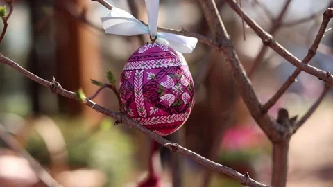 Wooden Easter egg painted with bright patterns Stock Footage 332154215
