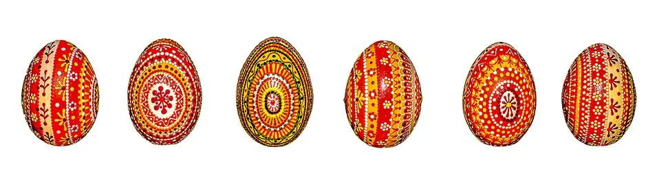 Wooden Easter eggs, painted in patterns by hand with acrylic paints, isolated Stock Photos