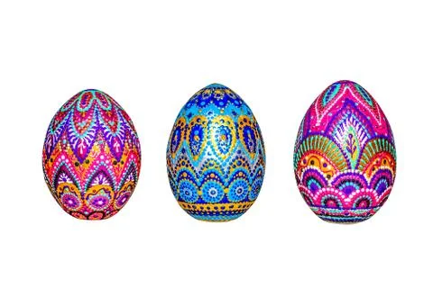 Wooden Easter eggs, painted in patterns by hand with acrylic paints, isolated Stock Photos