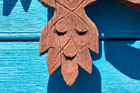 Wooden element of window frames on the old village house. Stock Photos