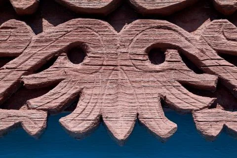 Wooden element of window frames on the old village house. Stock Photos