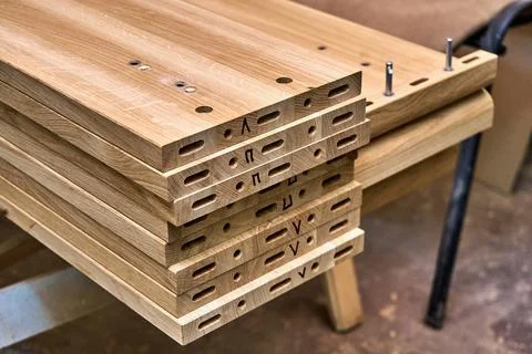 Wooden elements for double bed closeup. Furniture manufacture 스톡 사진