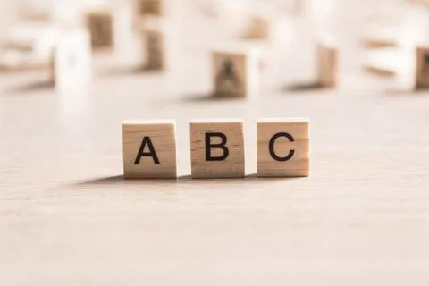 Wooden elements with the letters collected in the word abc 库存照片