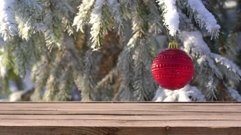 Wooden empty surface of tabel isolated at snowy pine or fir tree branches Stock Footage 142890365
