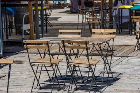 Wooden empty table for 4 persons of street cafe. Jerusalim. Stock Photos