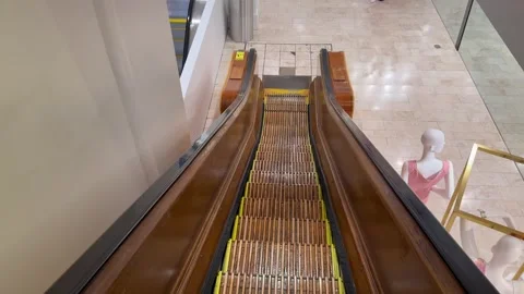 Wooden escalator inside the Macy's Herald Square department store, mall Stock Footage 340620157