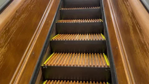 Wooden escalator inside the Macy's Herald Square department store, mall Stock Footage 340620228