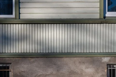 Wooden facade cladding with window exterior detail Stock Photos