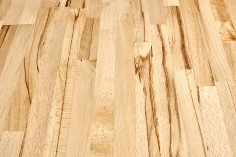 A wooden floor with a grain pattern Stock Photos
