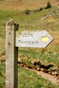 Wooden footpath signpost Stock Photos