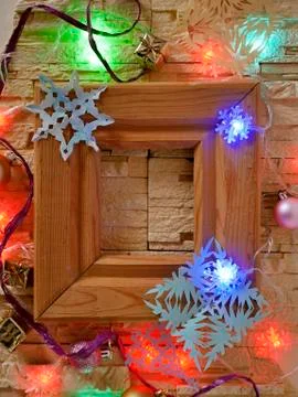 A wooden frame with empty space on a stone textural background Stock Photos