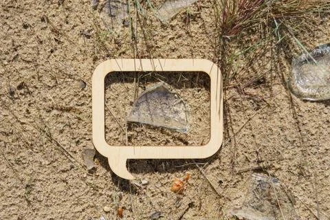 Wooden frame - a pointer, inside which a shard of broken glass Stock-Fotos
