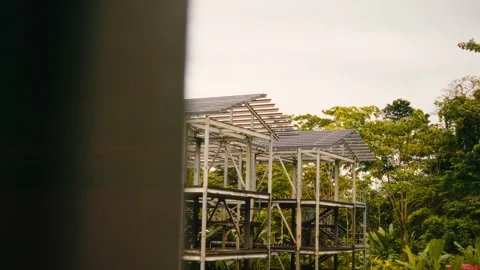 Wooden frame with solar panels under construction Stock Footage 346146868