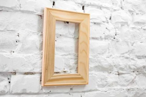 Wooden frame on the wall Stock Photos