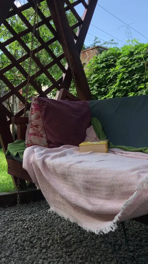 Wooden garden swing in the backyard Stock-Footage 341683245