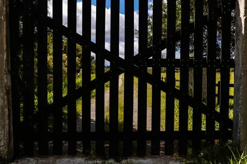 Wooden gate in the foreground Stock Photos
