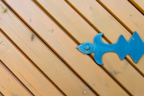 Wooden gate with forged elements close-up. Stock Photos