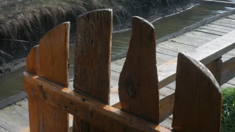 Wooden gate opens, closes by the wind Stock Footage 126964929