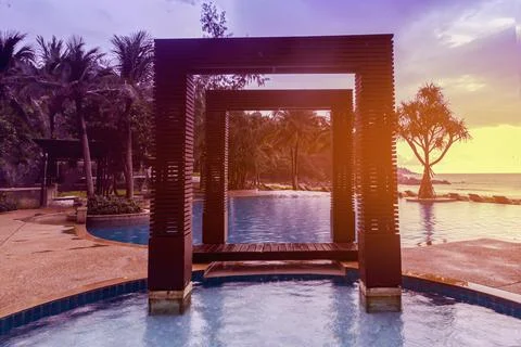 Wooden gate on the pool by the beach. elements of tropical design, the sea and Stock Photos