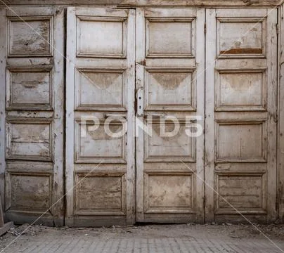 Wooden grunge weathered abandoned door Stock Photos