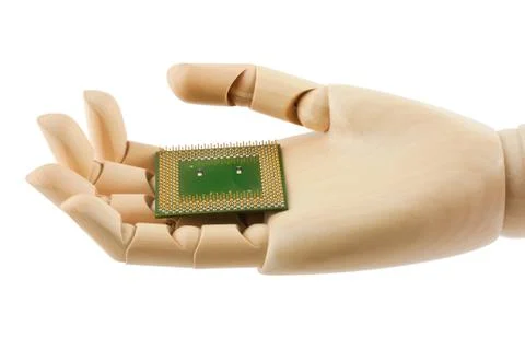 Wooden hand holding a processor Stock Photos