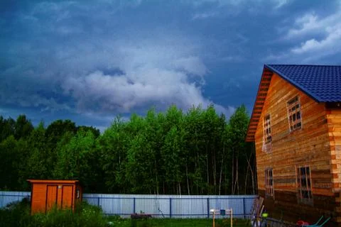 Wooden house for a rural plot in the spring Stock Photos