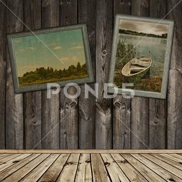 Wooden interior with old frames photos Stock Photos