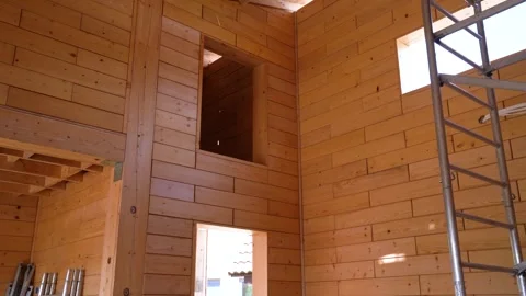Wooden Interior Under Construction with Exposed Frame and High Ceilings Video stock 313934441