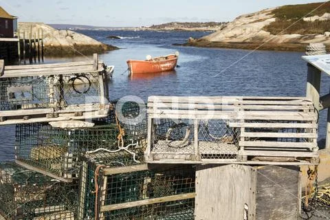 Wooden lobster traps on dock in Peggys Cove, Nova Scotia, Canada Stock Photos
